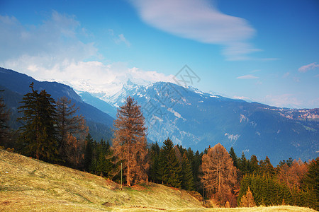 弹簧振动体石头顶峰爬坡旅游土地自由天空蓝色风景高山图片