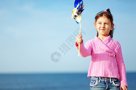 海滩上的孩子围巾衣服女性闲暇青年童年玩具儿童女孩婴儿图片