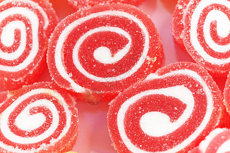 多彩的水果味甜食团体红色活力软糖美食食物甜点水果螺旋粉色图片