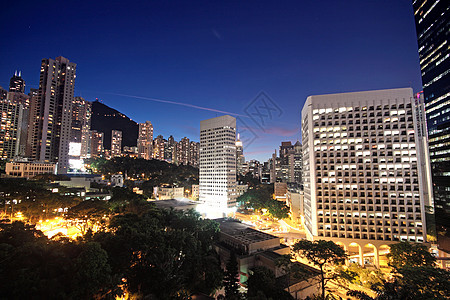 晚上在香港的办公大楼建筑工作地标日落旅游办公室摩天大楼反射建造城市图片
