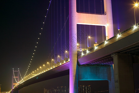 清马桥夜幕旅行速度运输天空岩石海洋城市市中心日落射线图片