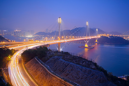 夜里香港清马桥射线汽车海洋场景辉光旅行曲线蓝色车辆城市图片