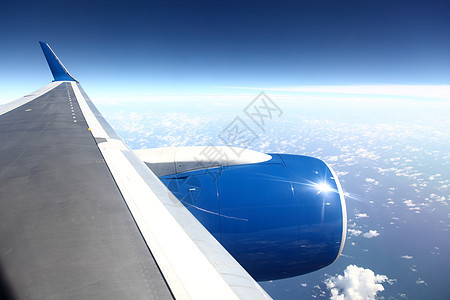 飞机飞行土地旅游天空力量翅膀假期地平线客机航班航空公司图片