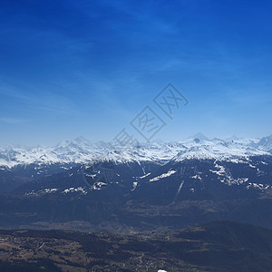 山上有高山太阳阳光阴霾高度风景蓝色单板顶峰滑雪板冰川图片