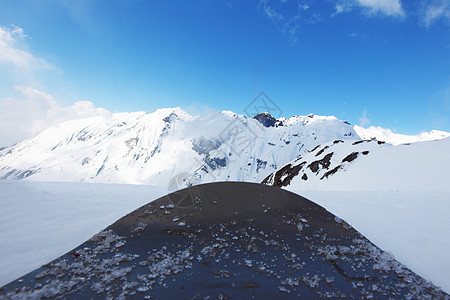 山上雪花风景太阳滑雪爬坡活动运动旅行蓝色旅游季节图片