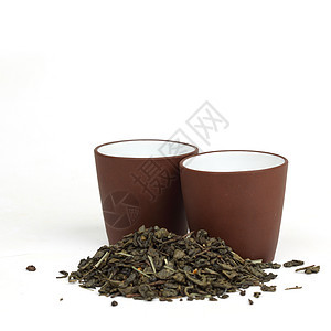 孤立的绿茶杯杯子种植园树叶文化饮料宏观叶子植物农业药品图片