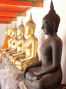 泰国的佛教和神庙艺术星星信仰建筑寺庙车轮射线雕像金子天空宗教图片