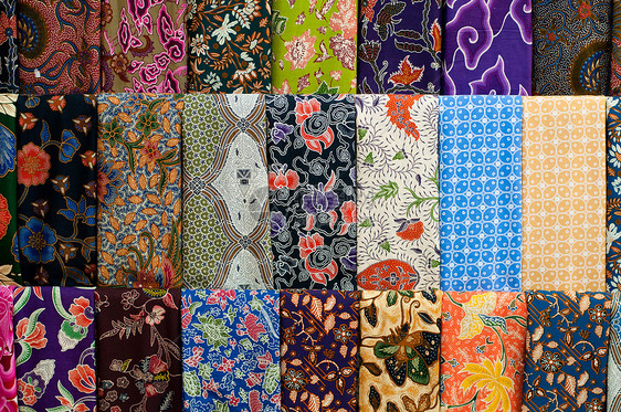 色彩多彩的 Batik旅行蜡染曲线市场连衣裙织物衣服装饰品编织工艺图片