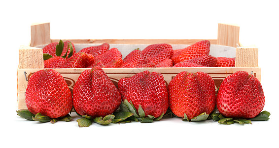 盒子里堆满红色的草莓活力食物团体美食小吃叶子甜点白色绿色水果图片