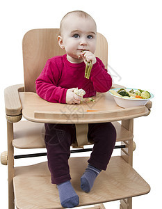 以高椅子吃饭的幼儿木头红色木材儿童白色小菜健康饮食食物蔬菜高脚椅图片