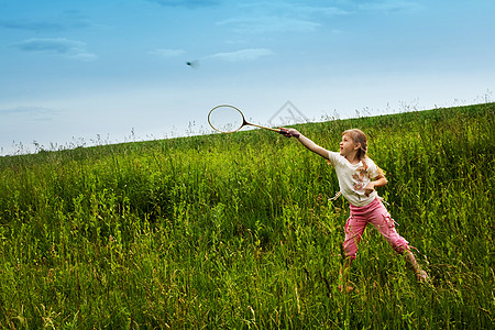 羽毛球玩家女孩运动场地孩子绿色图片