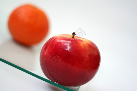 苹果和橙子小吃健康饮食艺术横截面生活方式绿色叶子甜食对象刷子图片