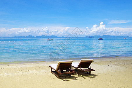 沙滩和热带海蓝色太阳海岸阳光假期海浪旅行支撑天堂海景图片