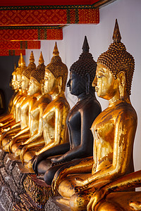 泰国佛像坐立泰国佛教徒建筑金子一条线上帝寺庙寺院雕塑雕像艺术性图片
