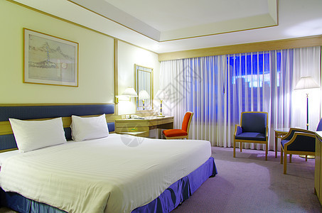 旅馆房间商业旅行桌子家具窗帘酒店房子假期地面床单图片