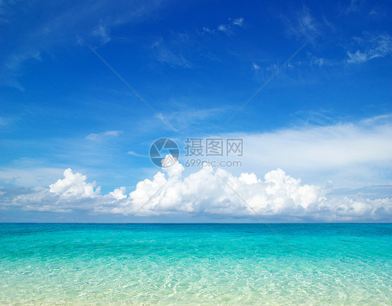 沙滩和热带海阳光海浪支撑冲浪旅行海景天空假期太阳天堂图片