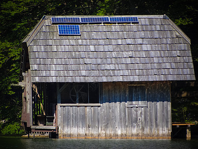 与太阳能阵列的渔船宿舍面板小屋环境阳光生物建筑学太阳光伏力量旅游图片