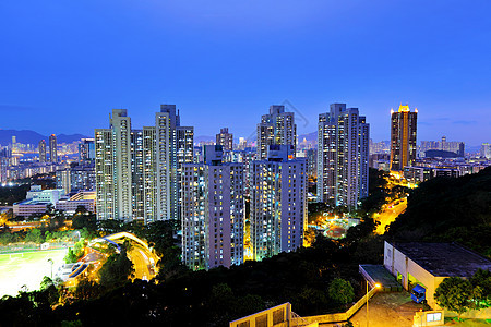 夜间城市人口密集日落摩天大楼商业蓝色游客景观旅行地标办公室旅游图片