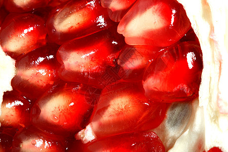 石榴花园异国红宝石饮食水果宏观食物谷物热带石榴石图片