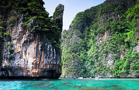 海和海假期旅行海滩石头悬崖风景海洋海景支撑爬坡图片