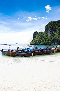 热带热带海滩血管岩石天空风景运输天堂蓝色珊瑚假期旅游图片