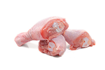 三个新鲜的生鸡腿白色皮肤粉色食物家禽图片