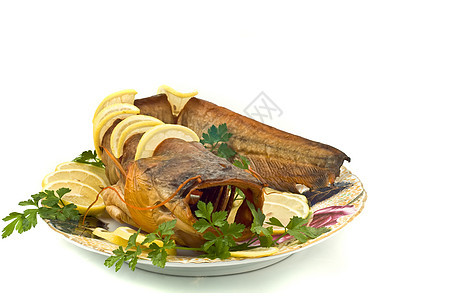 岸边晚宴     带柠檬的浮肿鱼(加热鱼)图片