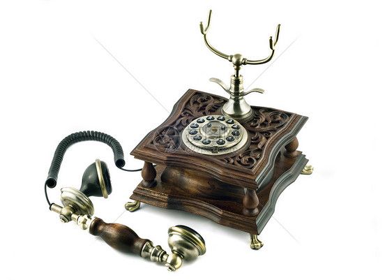 旧式电话数字听者白色时间旋转古董电讯棕色技术手机图片