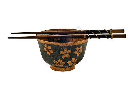 筷子和碗棕色厨房用具黄色蔬菜餐具木头团体食物黑色图片
