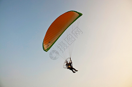 发动机滑翔机运动飞行员天空动力伞日落冒险降落伞空气太阳阳光图片