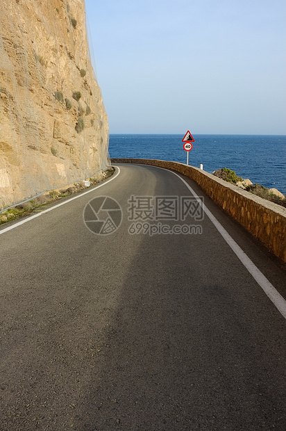 风景道路曲线海岸警告弯曲悬崖沥青岩石图片