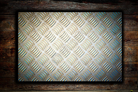 木制背景的金属板青铜金属木板名牌控制板指甲木材建造正方形框架图片