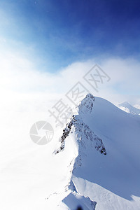 平面顶部暴风雪阳光季节蓝色运动顶峰旅行全景旅游太阳图片