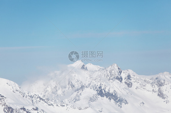 平面顶部爬坡运动全景冻结岩石天空蓝色暴风雪旅行高山图片