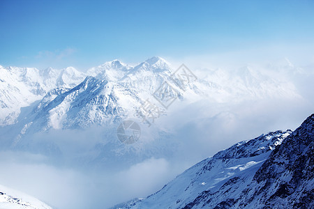 平面顶部风景单板爬坡旅行暴风雪季节旅游阳光岩石远足图片