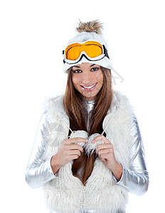 清新衣服带雪皮帽的亚洲印度黑褐色冬季女孩快乐微笑眼镜黑发工作室手势滑雪毛皮衣服幸福背景