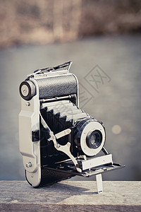 折叠相机怀旧摄影照片电影快门技术背景图片