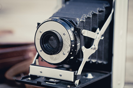 折叠相机怀旧摄影技术快门电影照片背景图片