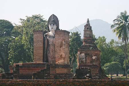 泰国Sukhothai历史公园热带地标废墟寺庙文化旅行遗产祷告石头宝塔图片