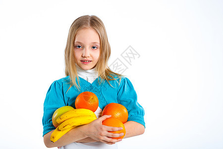 有水果的可爱小女孩女孩小吃孩子卫生白色乐趣食物女性早餐微笑图片