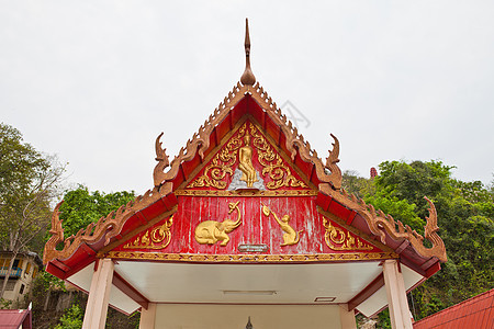 原装饰的寺庙屋顶详情蓝色金子边缘宗教旅游旅行天空文化对角线瓷砖图片