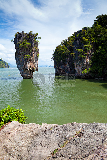 美丽的热带大热带宝石海岸情调海浪红树岩石天空旅行蓝色异国场景图片