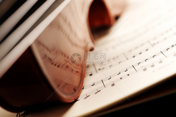 小提琴交响乐团活动乐器音乐红色木头音乐会风格演艺乐谱图片