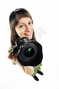 年轻女孩举起相机摄影师女孩们影棚青年单反镜片背景图片
