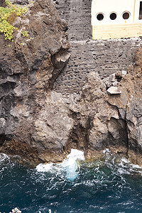 马 提拉泡沫岩石蓝色水池火山小岛波浪海洋海岸悬崖图片