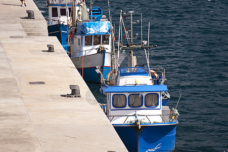 马 提拉海洋波浪港口钓鱼渔船海岸墙壁渔夫渔民蓝色图片
