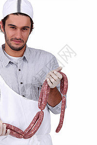 有香肠的屠夫男人展示杂货商服务牛肉男性熟食猪肉投标工匠图片