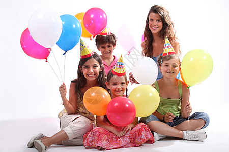 儿童生日晚会家庭女孩们女孩工作室帽子兄弟气球乐趣微笑庆典图片