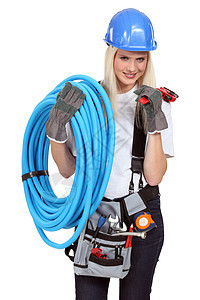 女性水管工腰带磁带安全塑料金发刀具扳手司机微笑工作室图片
