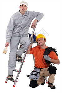 油漆工和电工工人员工企业建设者职员劳动微笑商业职业装潢师图片